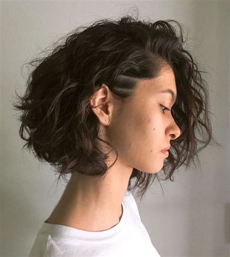 undercut haircut curly hair|women wearing undercut haircuts.